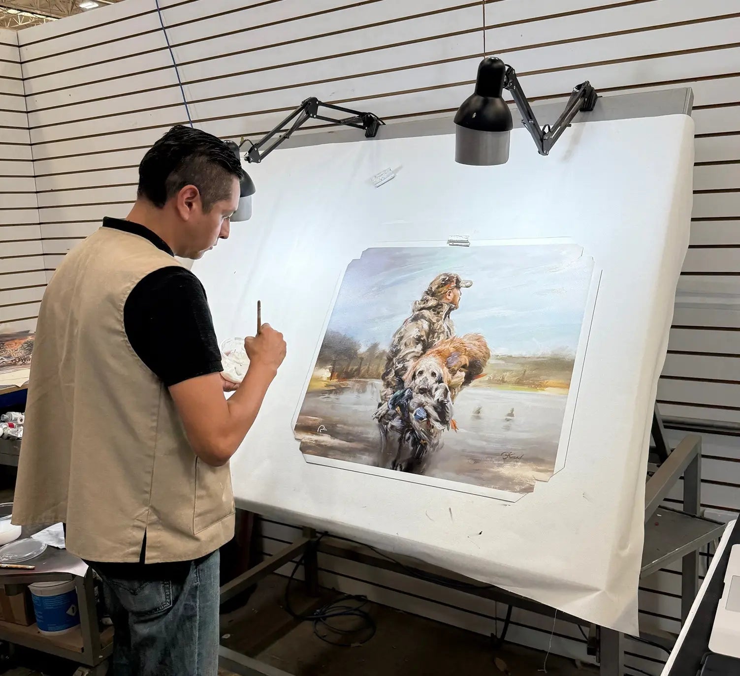 An artist painting on canvas